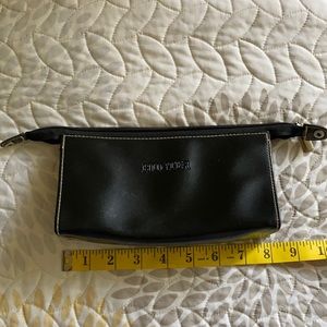 Hunter clutch black with two flaws as shown in picture. Vinyl.